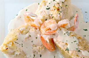 Photo Recette Coquilles Farcies aux Crevettes et au Crabe dans une Sauce Crémeuse à L’ail